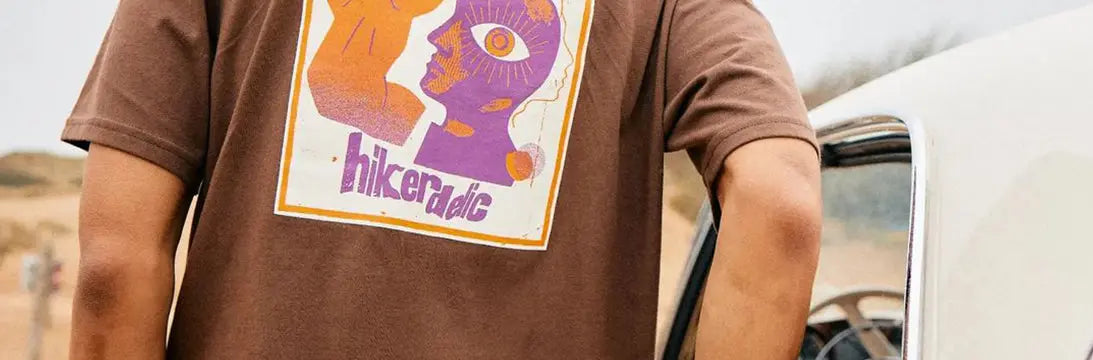 Man Wearing Hikerdelic Branded T-Shirt