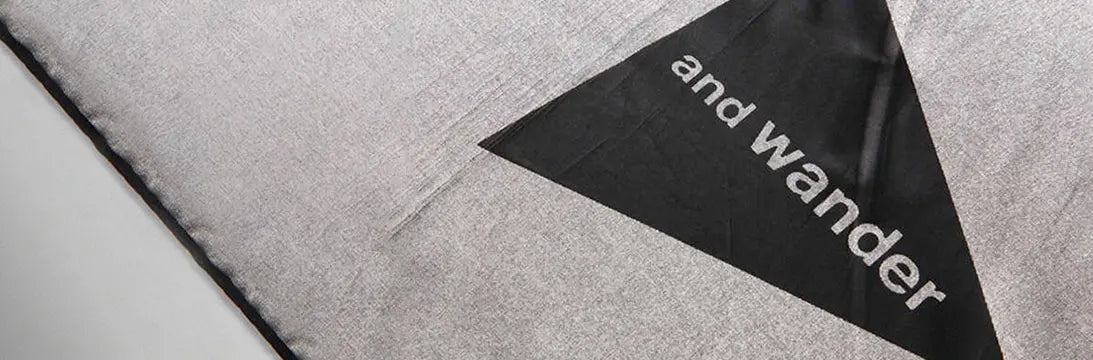 And Wander Brand Label