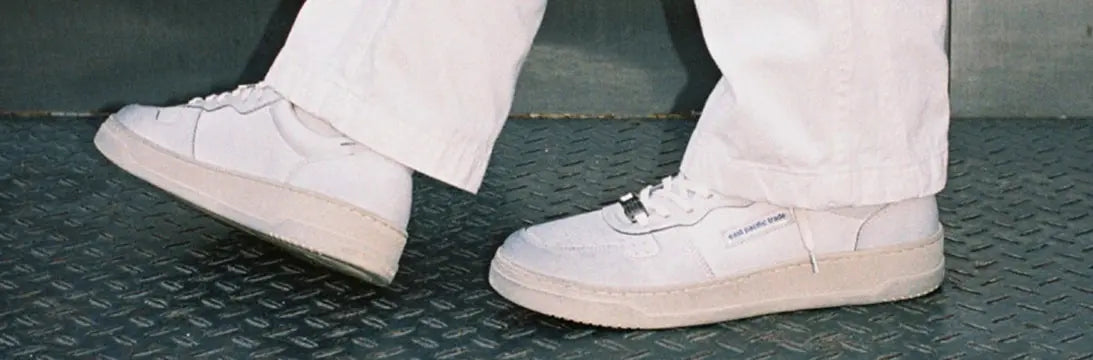 Pair of White East Pacific Trade Trainers
