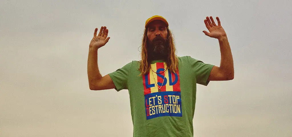 Bearded Man Wearing Green TSPTR T-Shirt Printed LSD Let's Stop Destruction