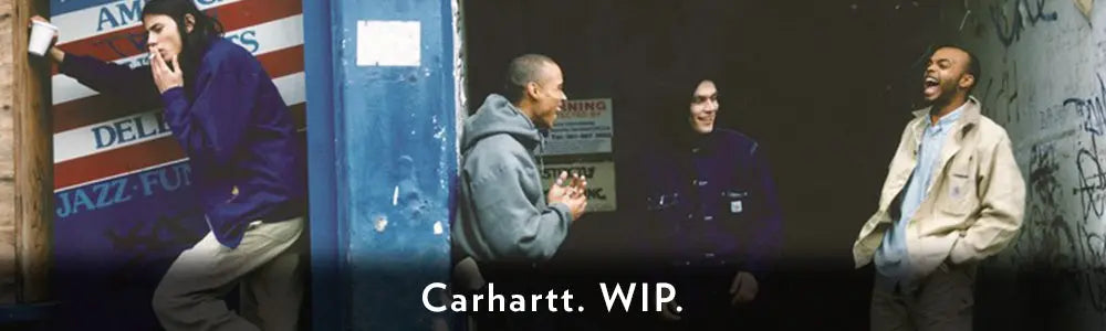 Men Wearing Carhartt WIP Clothing Chatting in the Street